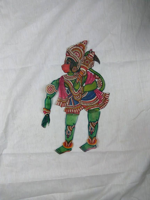 Leather painting kalamkari puppet art depicting Hanuman as wall decor, showcasing intricate details and vibrant colors on leather, embodying Indian heritage and spiritual values, ideal for adding cultural significance to any space.