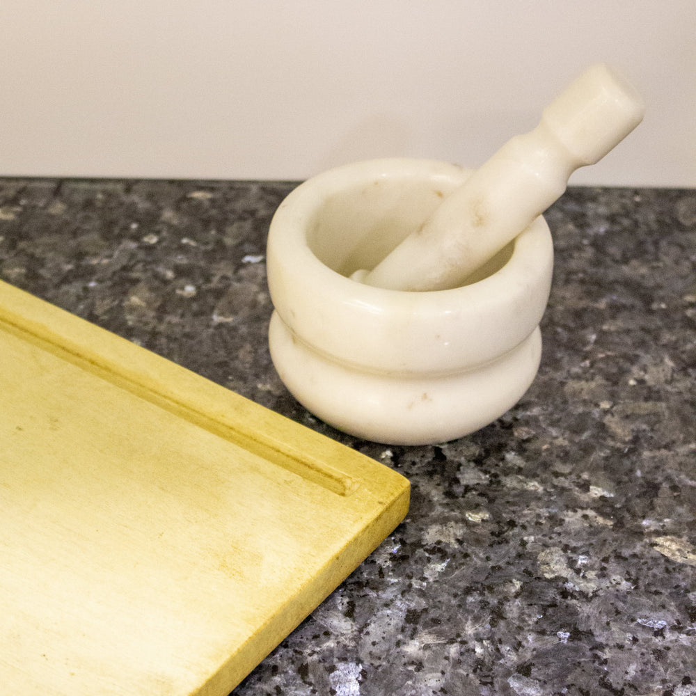 
                  
                    White Indian Marble Concentric Mortar and Pestle
                  
                