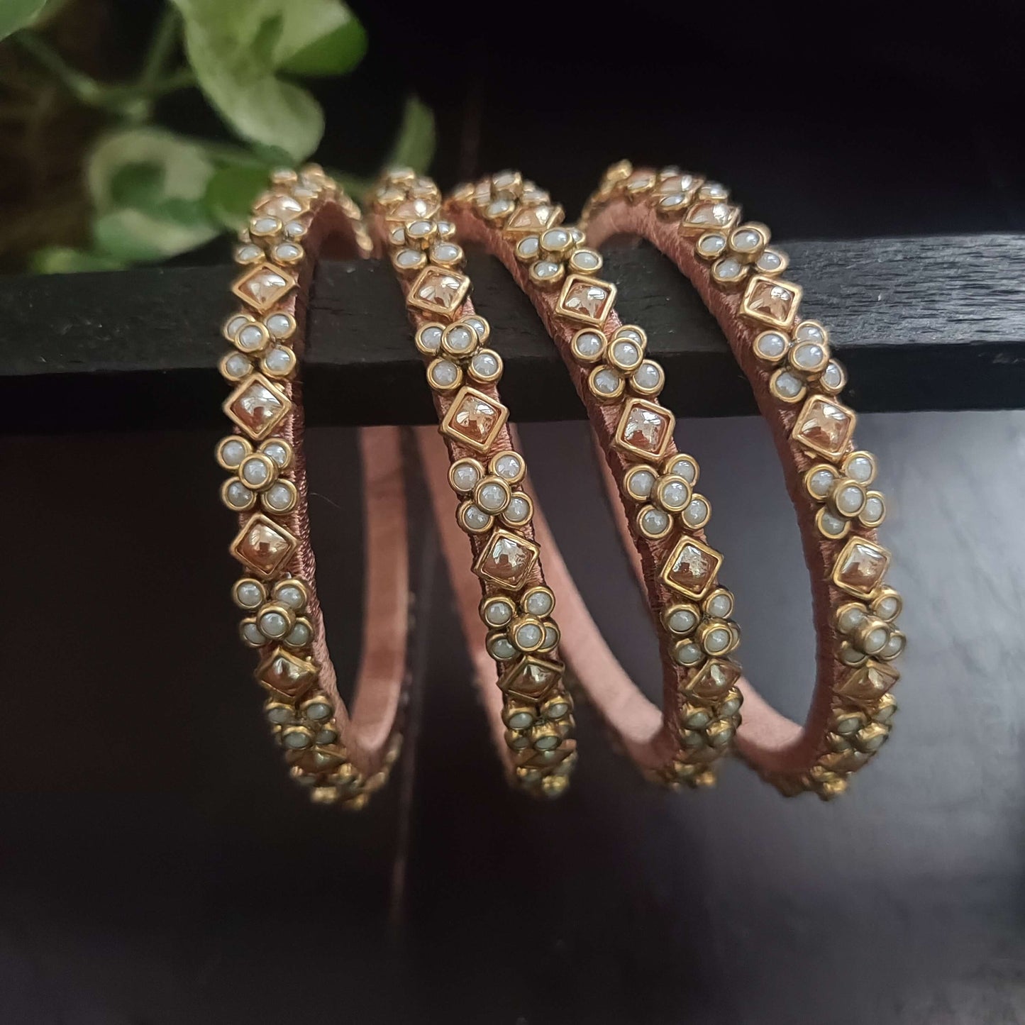 Gold and pearl kundan silk thread bangles