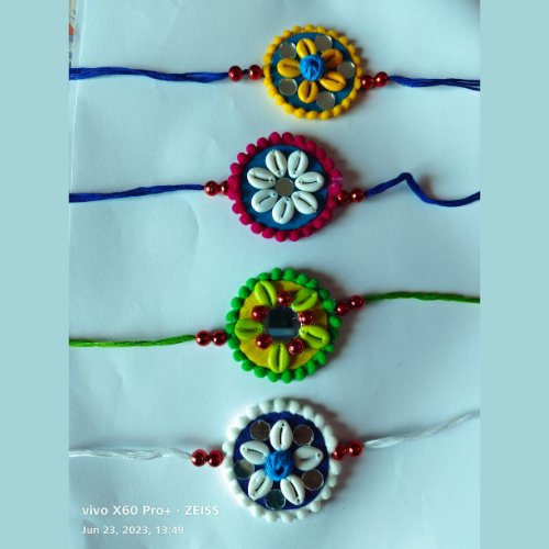 
                  
                    Raksha Bandhan Rakhi With Special Fabric (Set of 4) - Kreate- Festive
                  
                