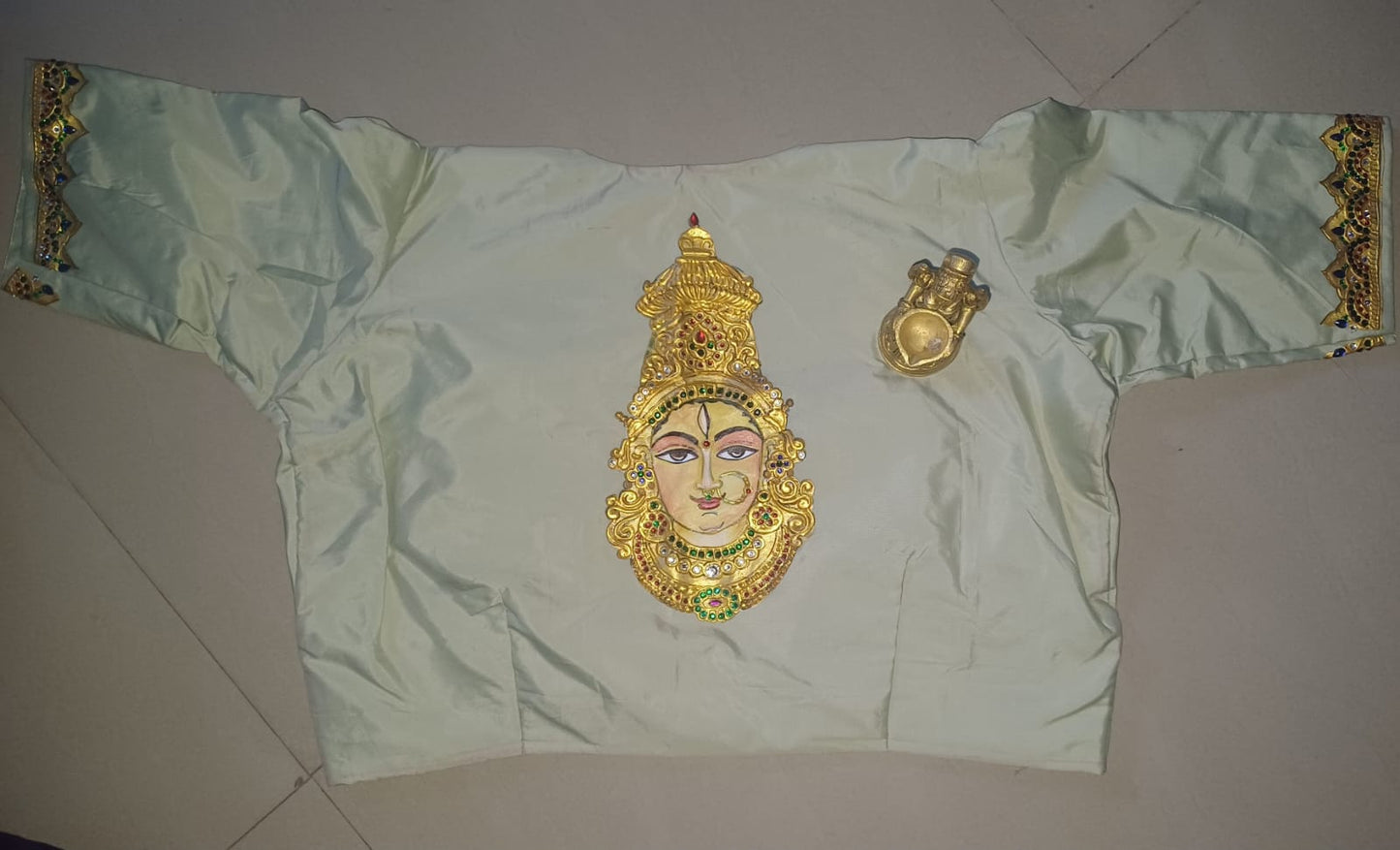 Hand-Painted Tanjore Goddess Lakshmi on Pista Green Jasmine Silk High-Neck Blouse