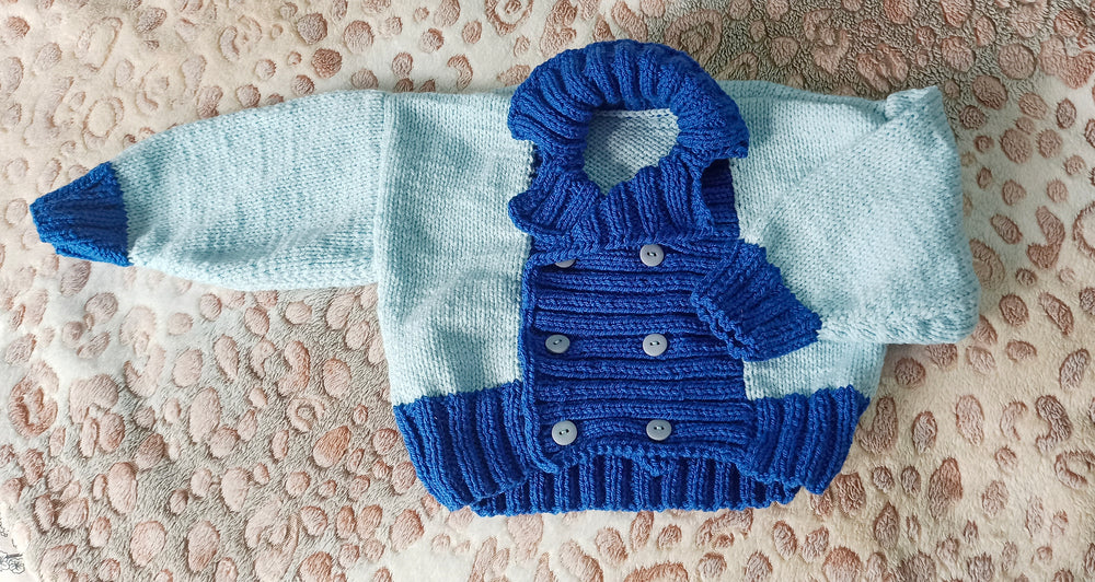 Handknitted Baby Reefer Jacket for 6-12 Months, Unisex, in Two Contrasting Shades of Blue with Wide Collar Design, Made from 100% Acrylic Yarn, Perfect for Keeping Your Little One Warm, Handmade in a Pet-Free House.