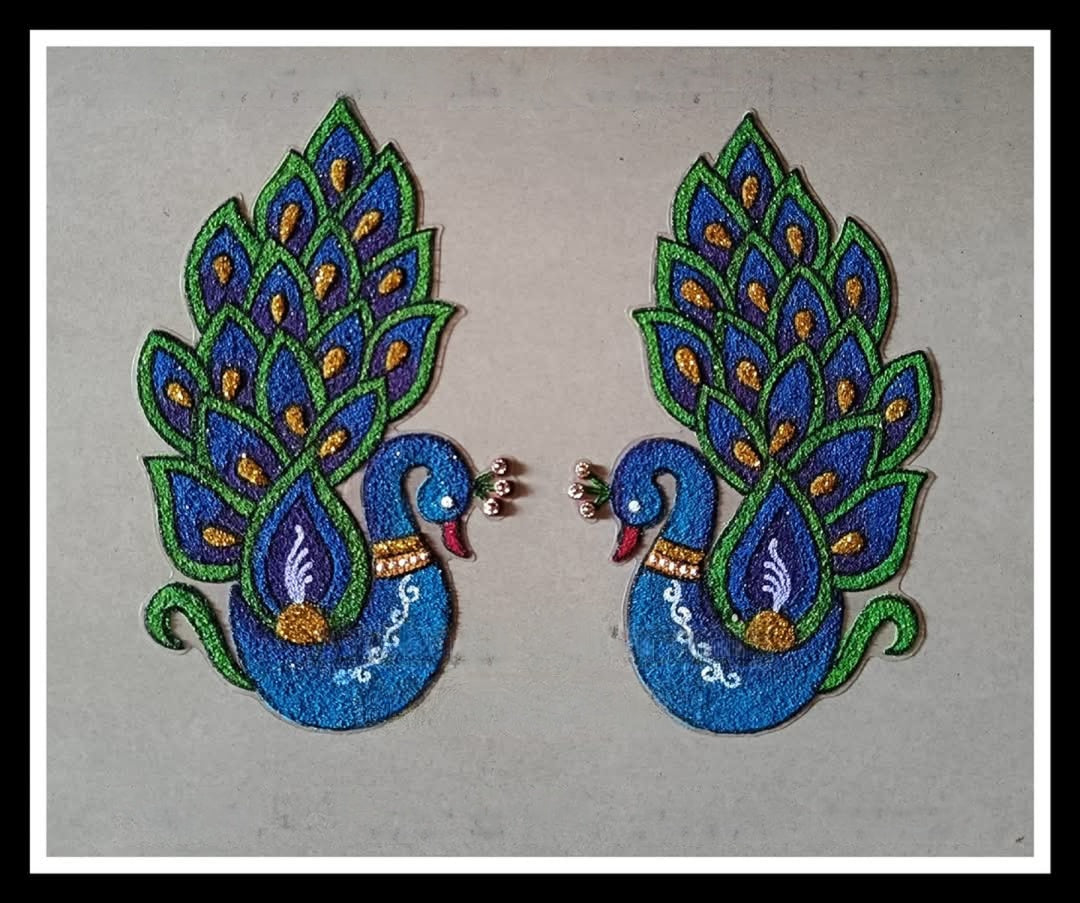 
                  
                    Peacock rangoli
                  
                
