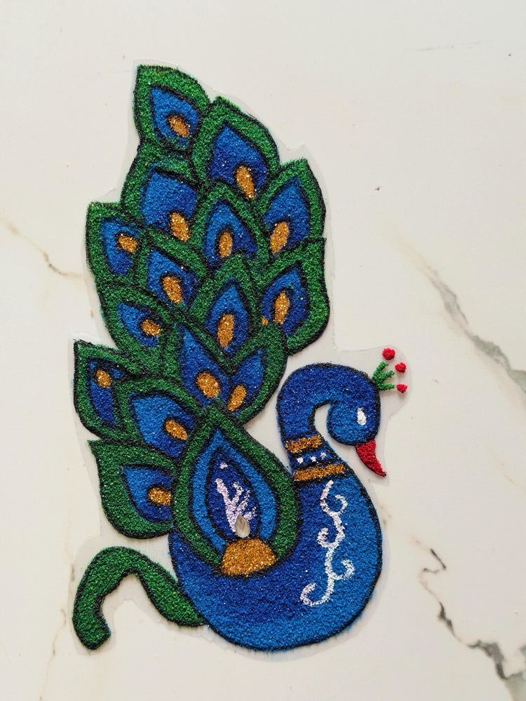 
                  
                    Peacock rangoli
                  
                