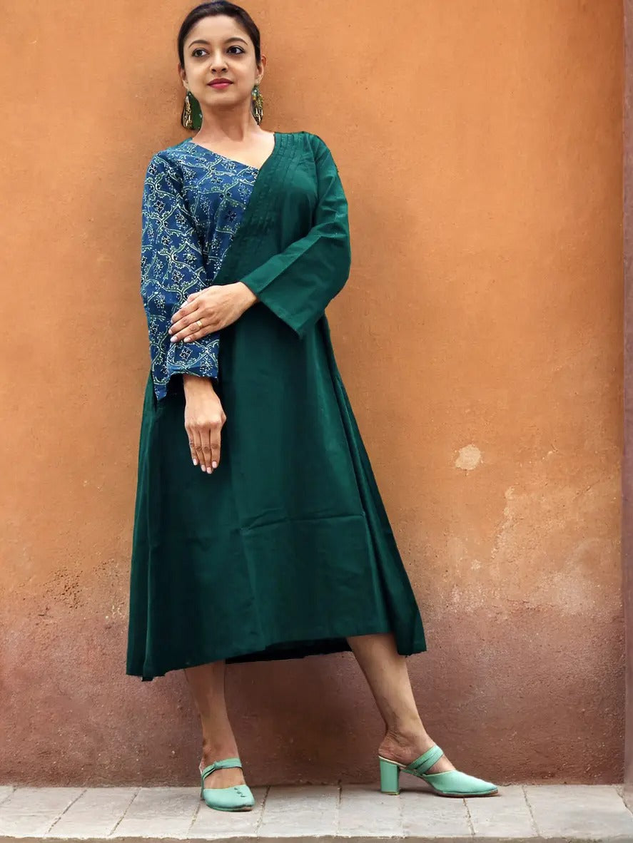
                  
                    ABASHA - Free Flow Kimono themed Front Up Back Down Flow Dress Ajrakh block Print highlights on right Sleeve and Neck Line .
                  
                