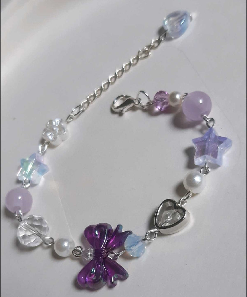 
                  
                    Purple bow bracelet
                  
                