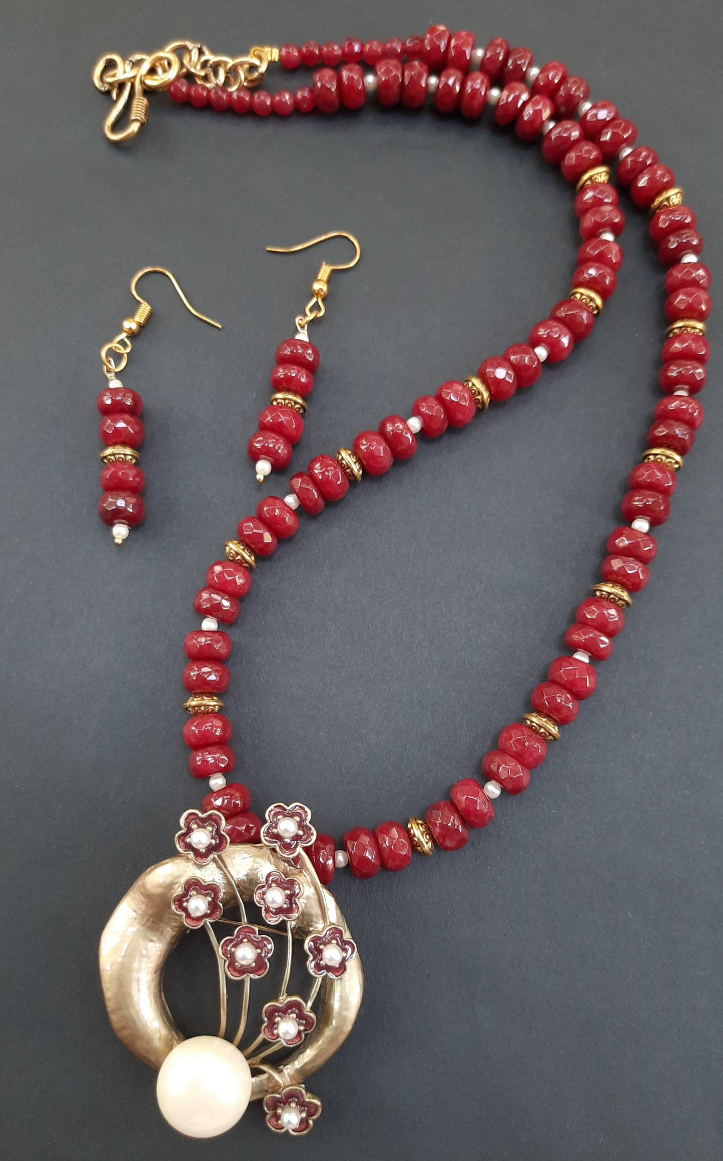 
                  
                    Elegant chocolate color tyre agate beads necklace with flower pendant and matching earrings
                  
                