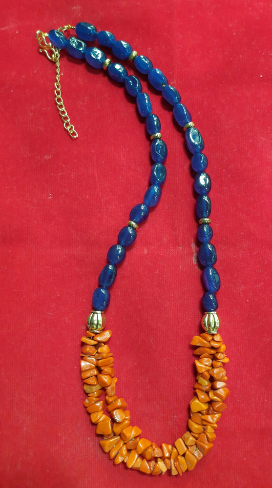 
                  
                    Stylish combo of double layer red chip agate beads and blue Dul Dul agate beads necklace.
                  
                