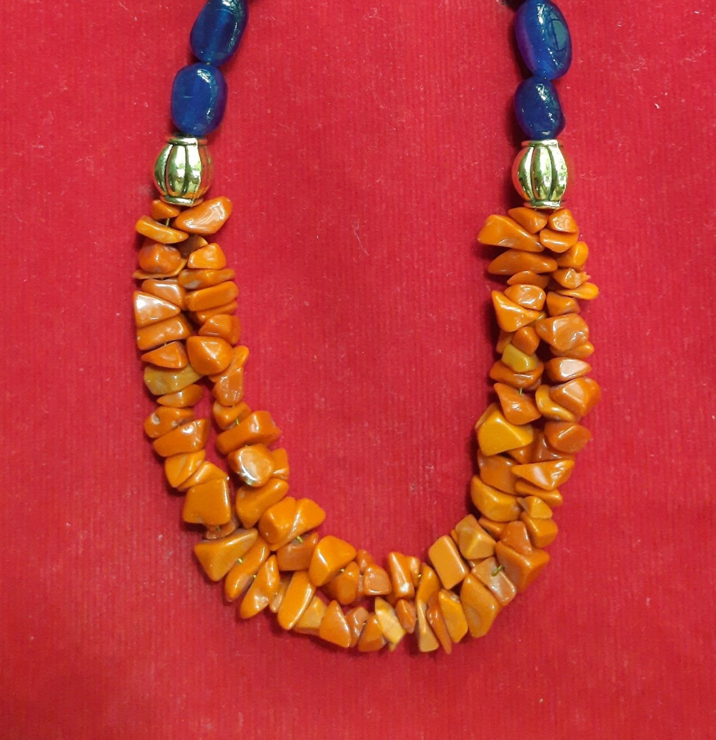 
                  
                    Stylish combo of double layer red chip agate beads and blue Dul Dul agate beads necklace.
                  
                