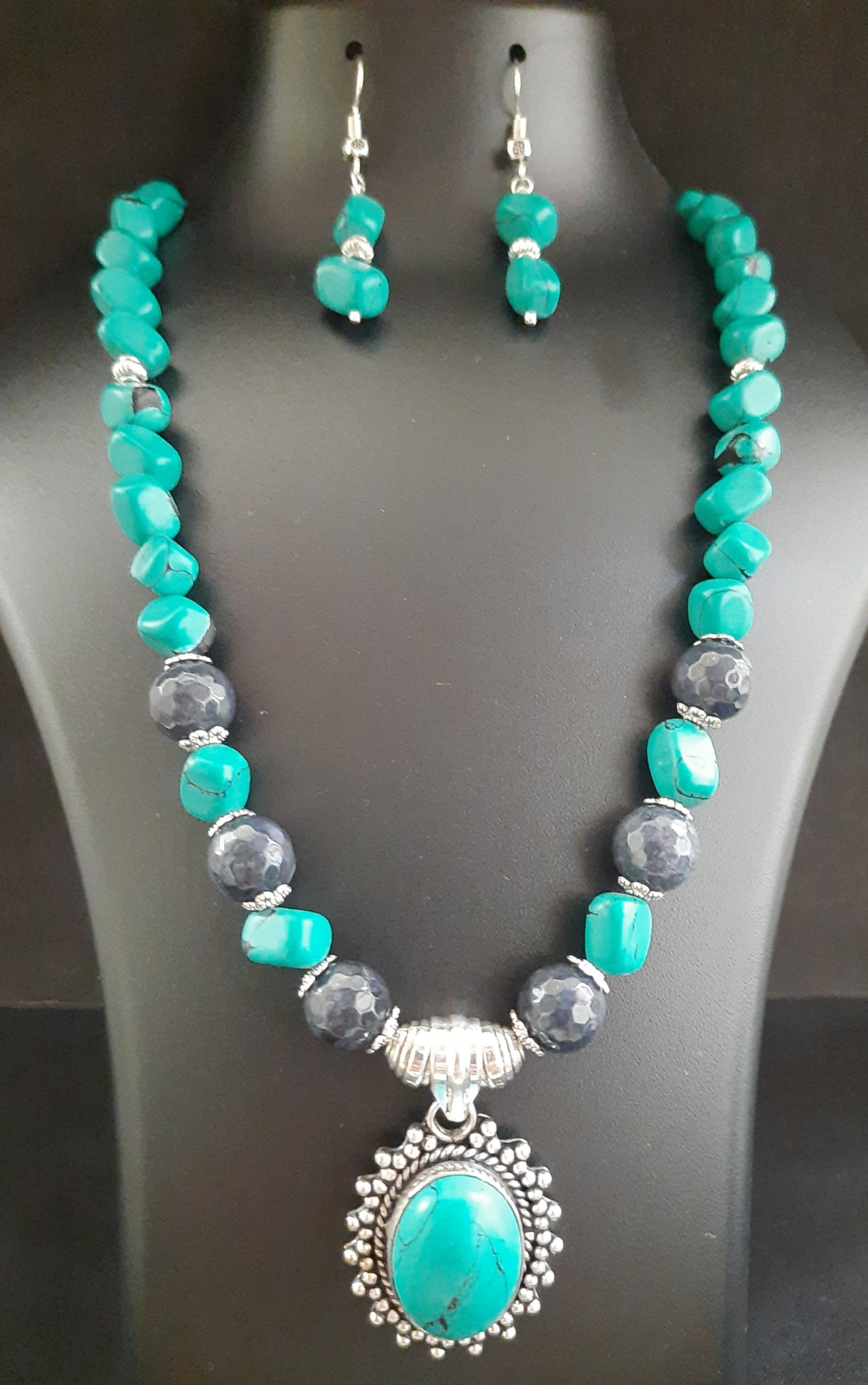 
                  
                    Subtle turquoise blue nuggets beads necklace with pendant and earrings.
                  
                