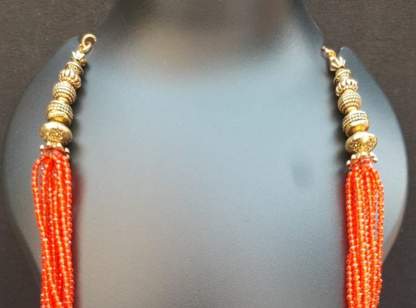 
                  
                    Lovely orange hydrobeads multilayered  neckpiece
                  
                
