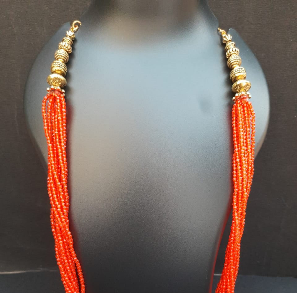 
                  
                    Lovely orange hydrobeads multilayered  neckpiece
                  
                