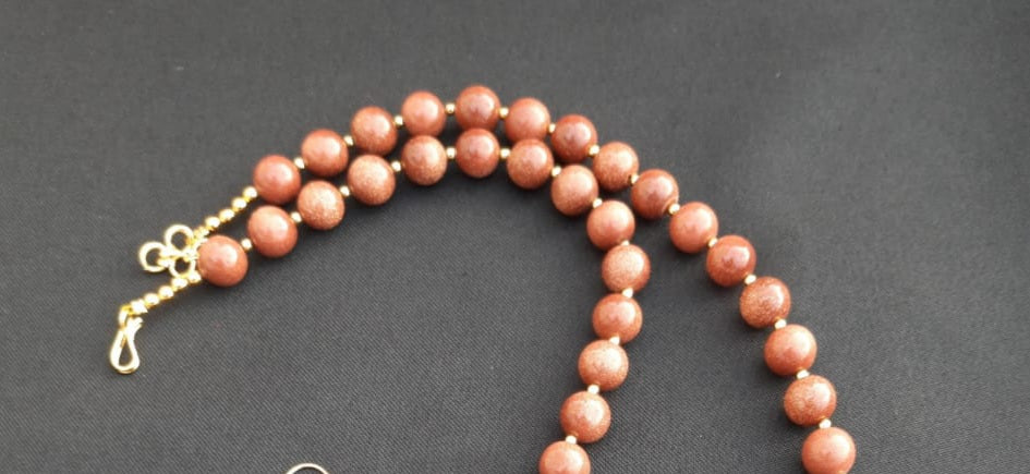 
                  
                    Sparkling sunstone beads necklace with matching earrings
                  
                