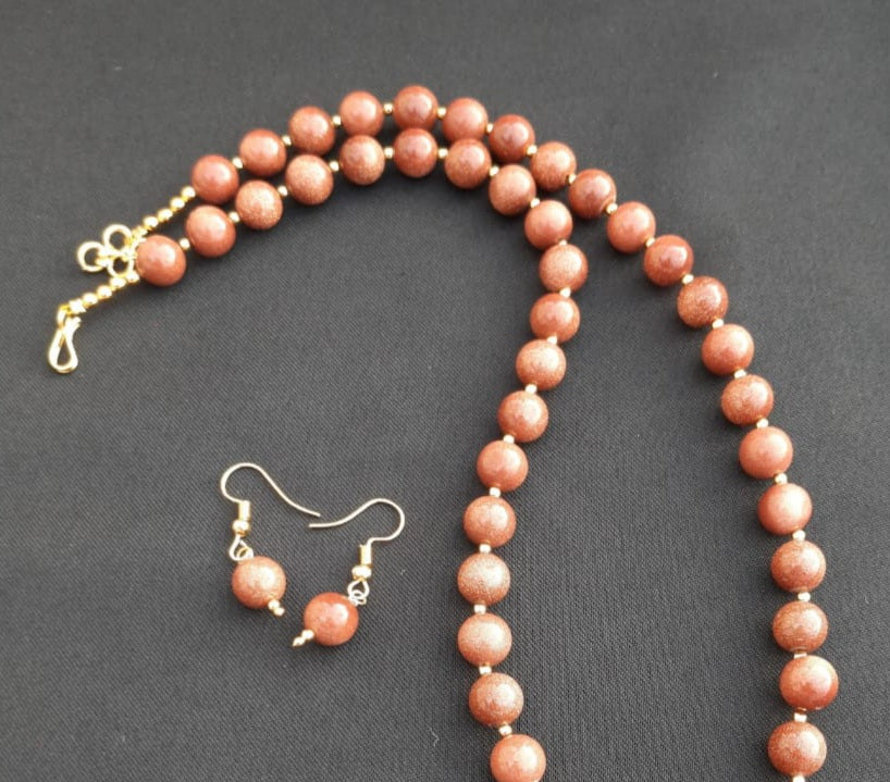 
                  
                    Sparkling sunstone beads necklace with matching earrings
                  
                
