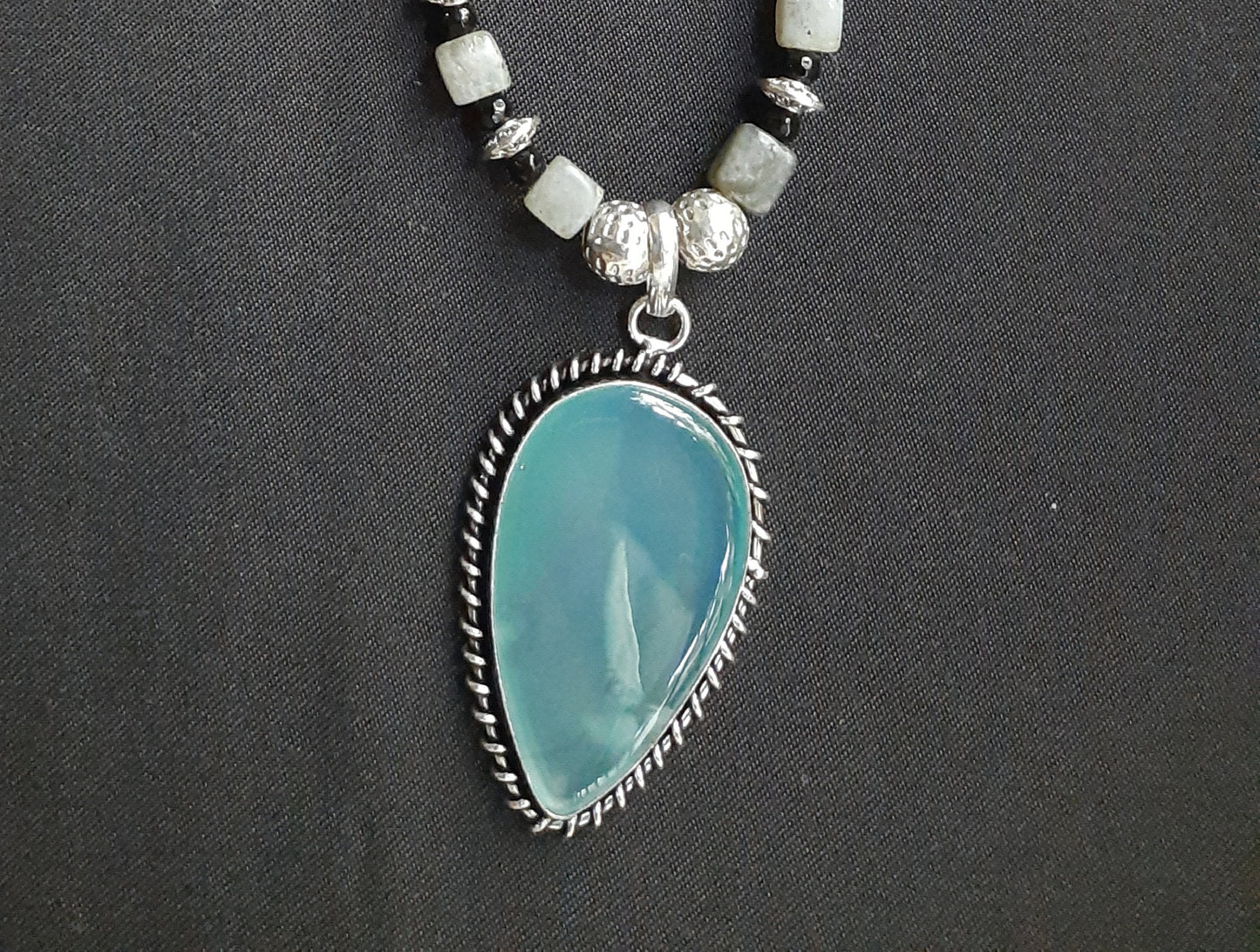 
                  
                    Stylish Grey Colour Square Agate Beads Necklace With matching pendant and earrings.
                  
                