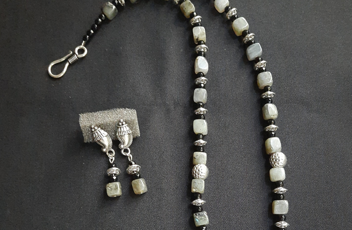 
                  
                    Stylish Grey Colour Square Agate Beads Necklace With matching pendant and earrings.
                  
                