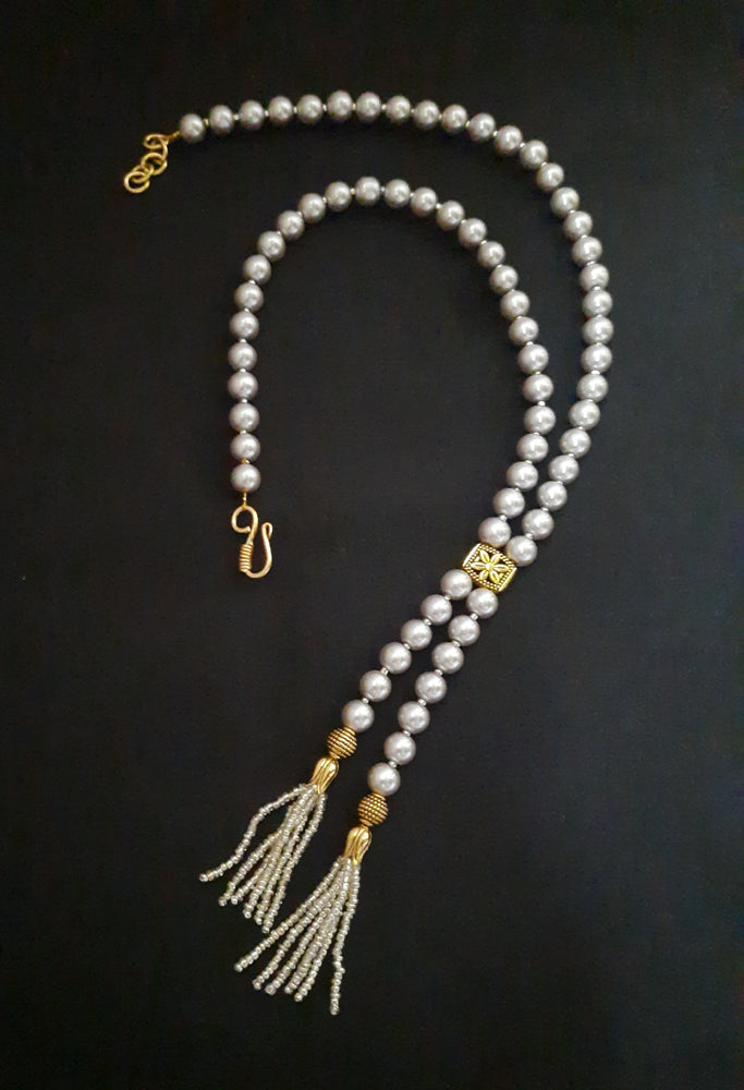 
                  
                    Classic grey shaded shell pearl mala
                  
                