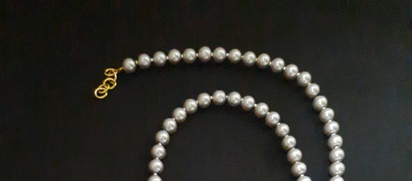 
                  
                    Classic grey shaded shell pearl mala
                  
                