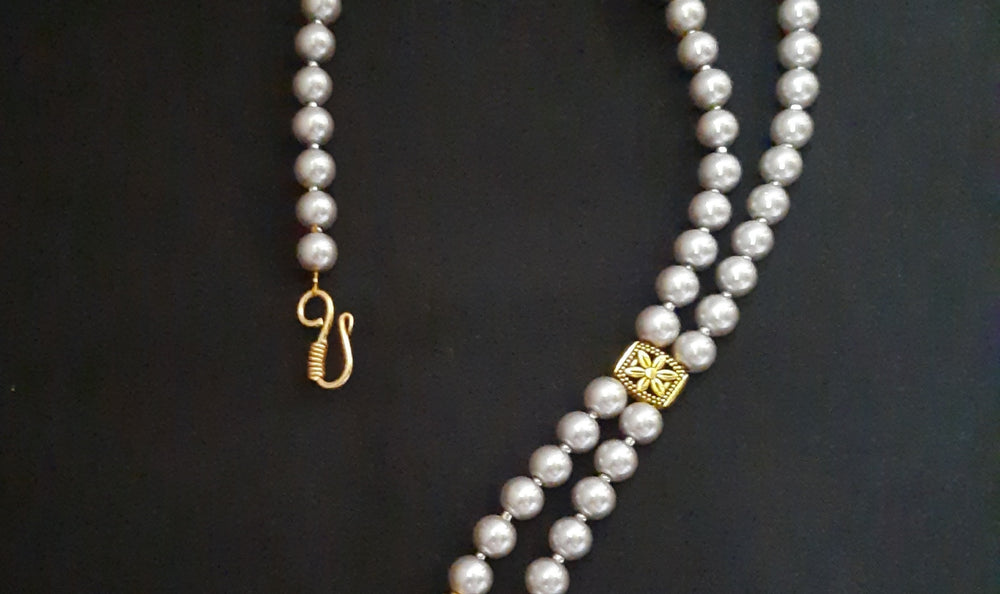 
                  
                    Classic grey shaded shell pearl mala
                  
                