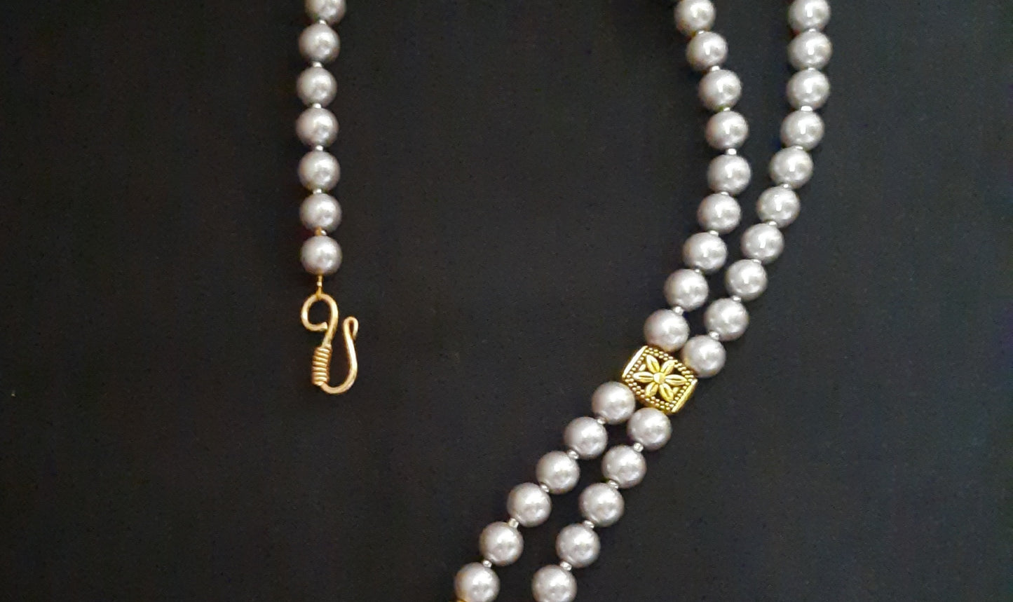 
                  
                    Classic grey shaded shell pearl mala
                  
                