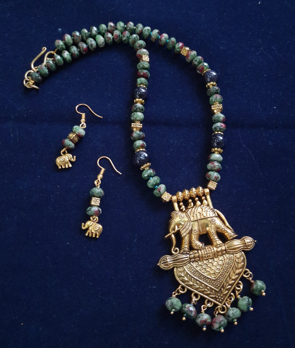 Elegant tyre beads mala with sand beads and elephant pendant.