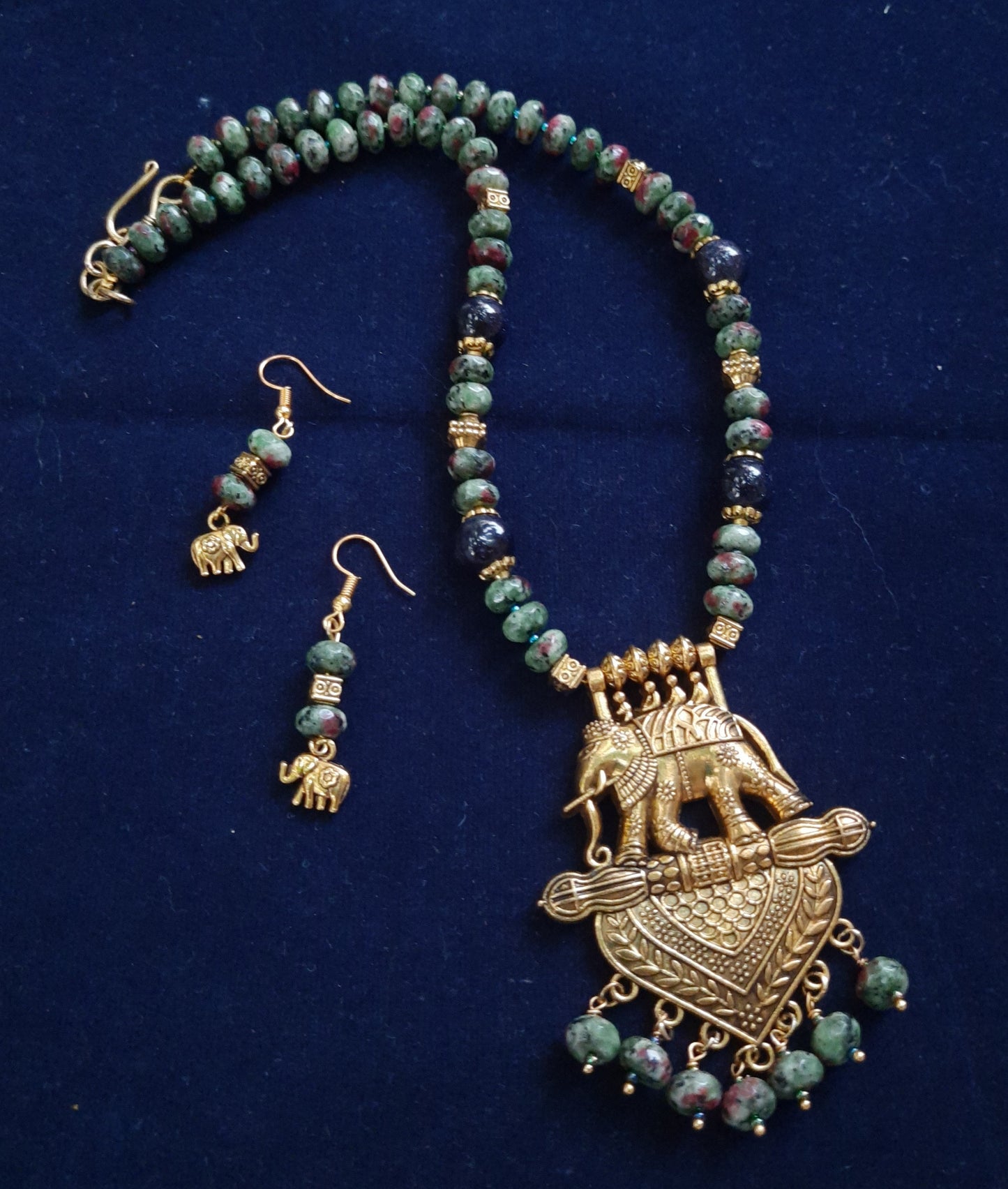 
                  
                    Elegant tyre beads mala with sand beads and elephant pendant.
                  
                