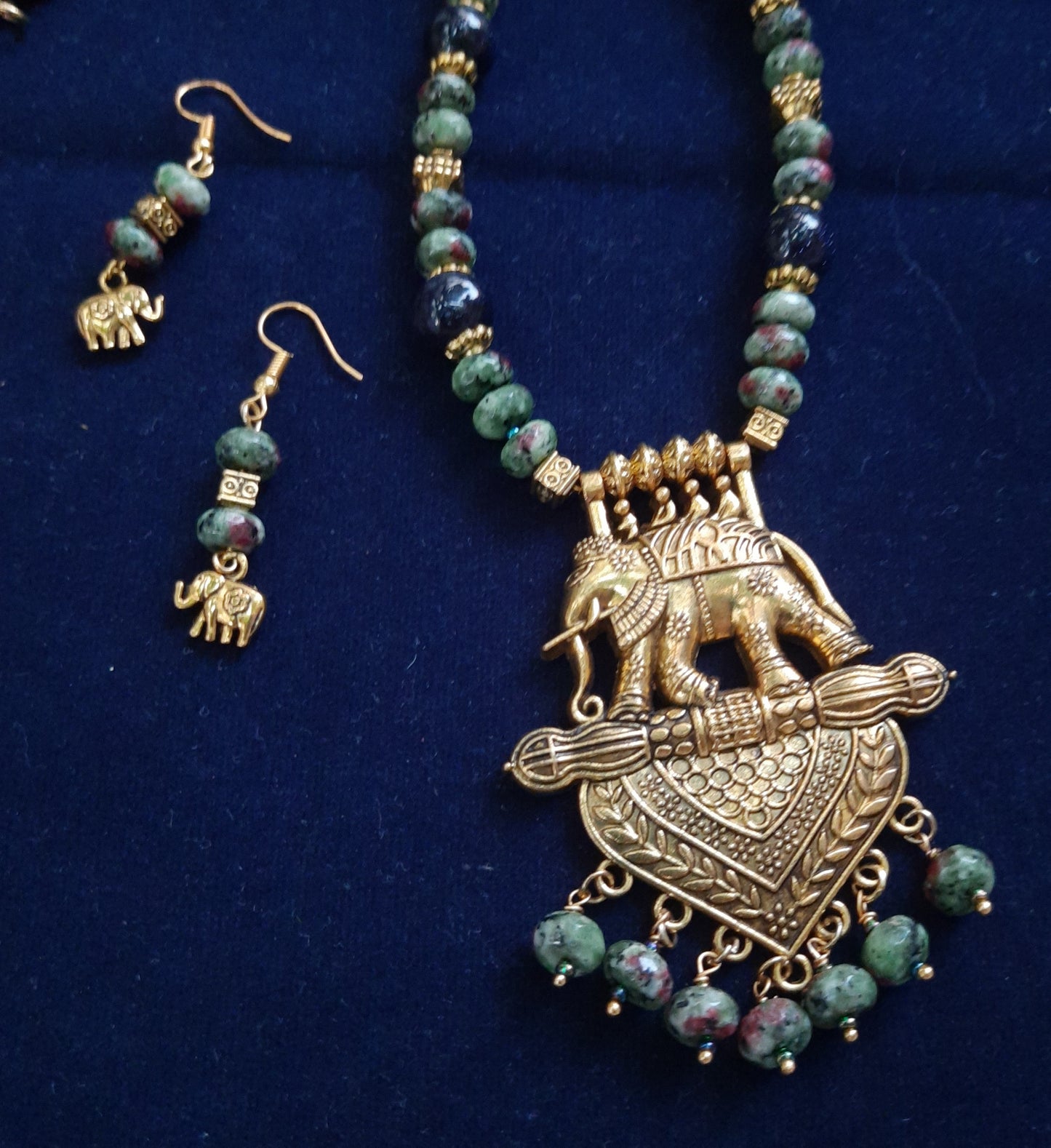 
                  
                    Elegant tyre beads mala with sand beads and elephant pendant.
                  
                