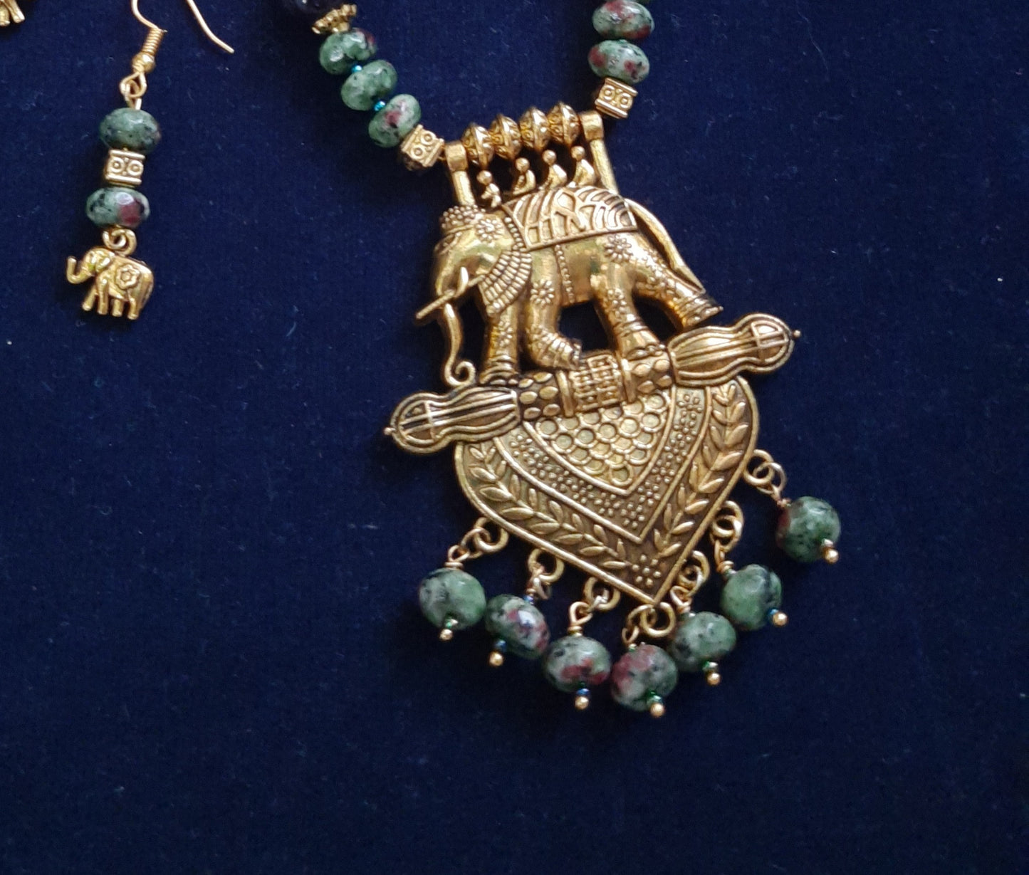 
                  
                    Elegant tyre beads mala with sand beads and elephant pendant.
                  
                