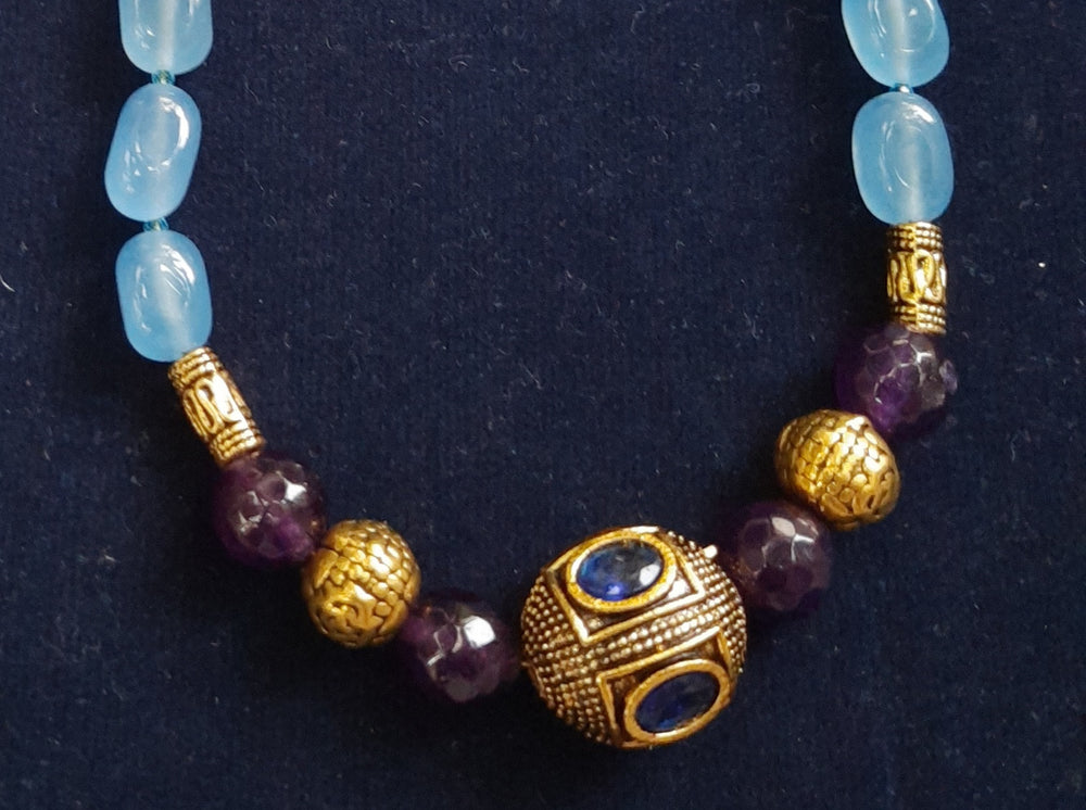 
                  
                    Glittering Aqua blue single layer dul dul agate beads jewellery
                  
                