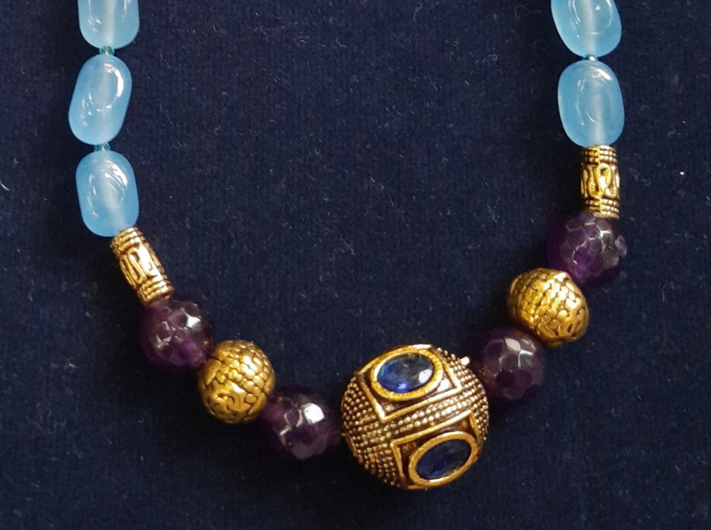 
                  
                    Glittering Aqua blue single layer dul dul agate beads jewellery
                  
                
