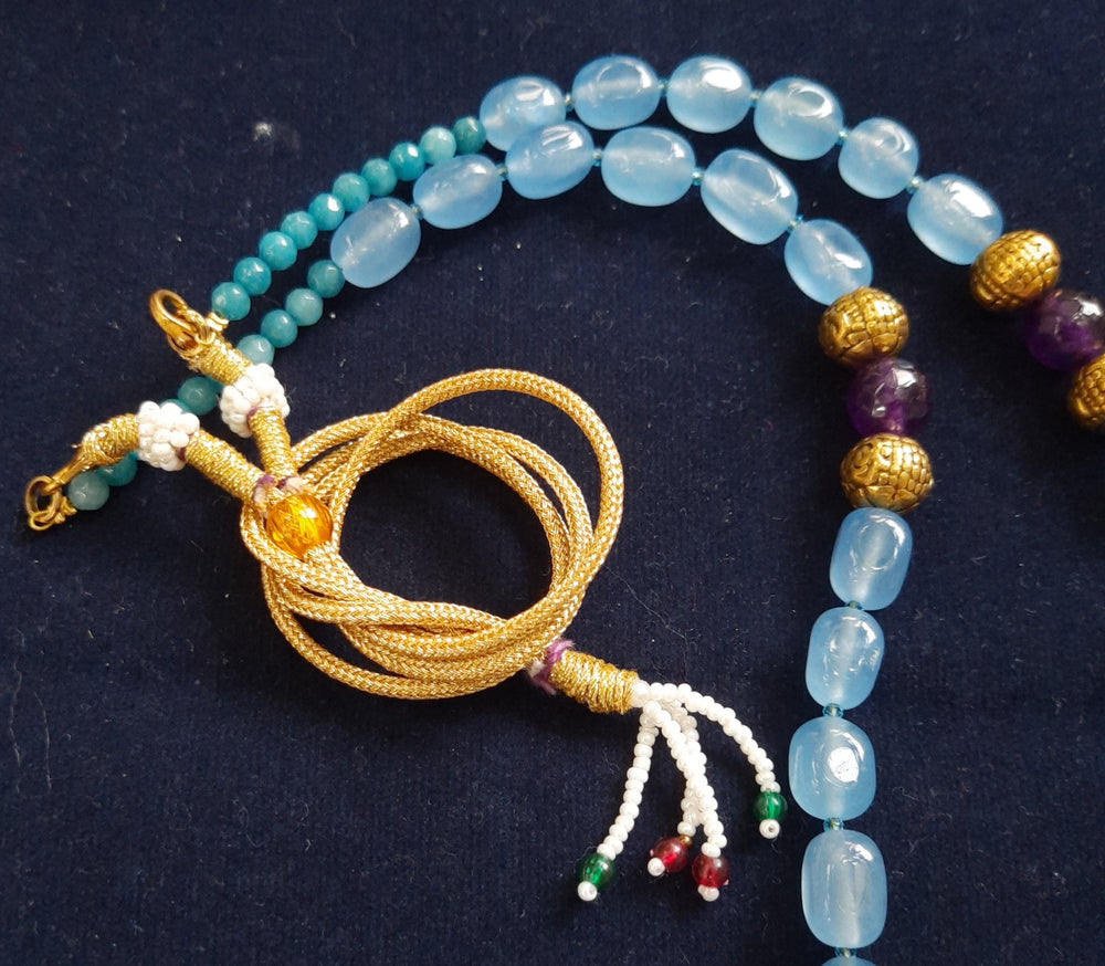 
                  
                    Glittering Aqua blue single layer dul dul agate beads jewellery
                  
                