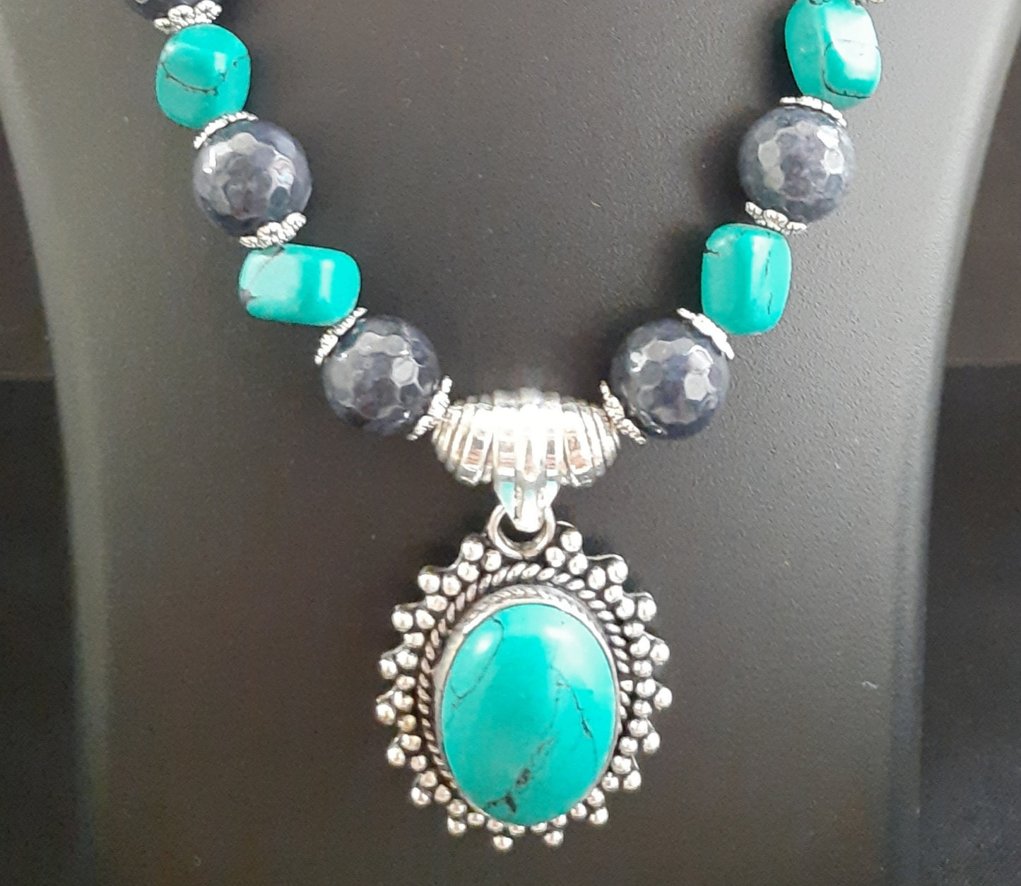 
                  
                    Subtle turquoise blue nuggets beads necklace with pendant and earrings.
                  
                