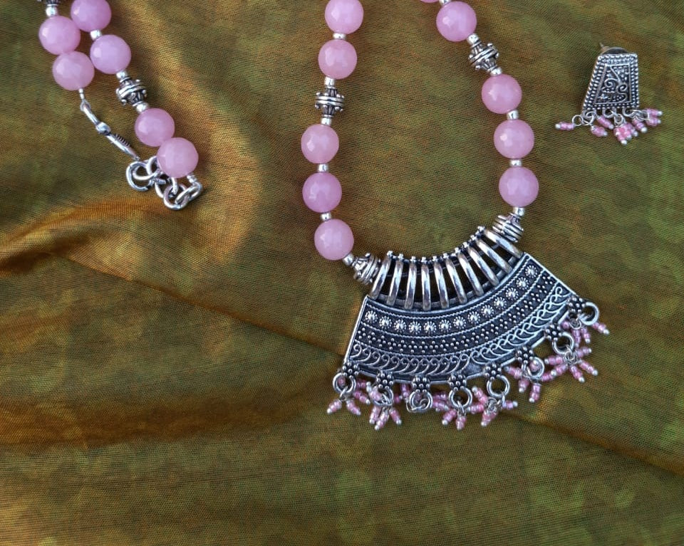 
                  
                    Lovely baby pink agate beads necklace with attractive pendant and earrings.
                  
                
