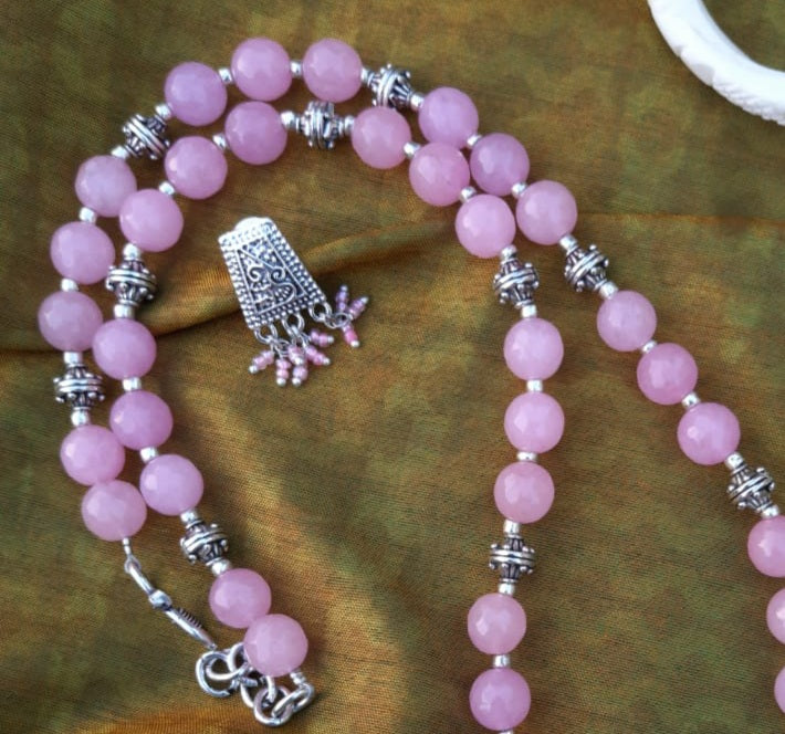 
                  
                    Lovely baby pink agate beads necklace with attractive pendant and earrings.
                  
                
