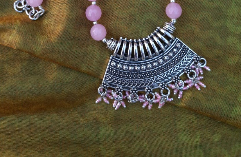 
                  
                    Lovely baby pink agate beads necklace with attractive pendant and earrings.
                  
                