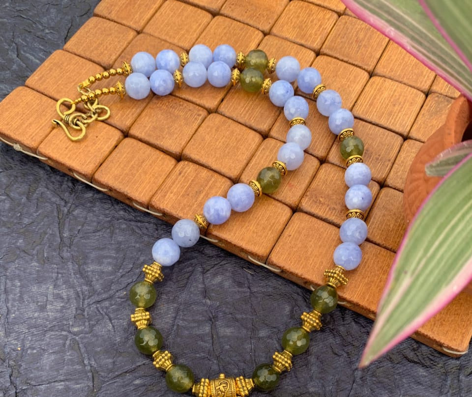 
                  
                    Stylish handcrafted  necklace with baby blue and olive green agate beads
                  
                