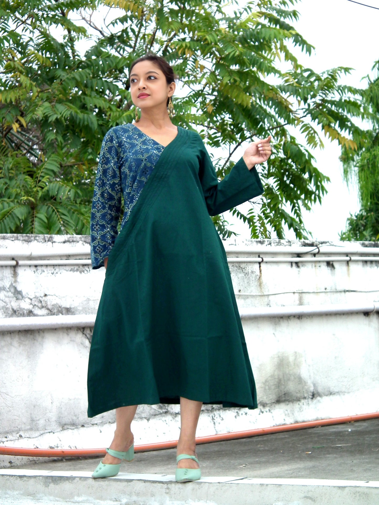 
                  
                    ABASHA - Free Flow Kimono themed Front Up Back Down Flow Dress Ajrakh block Print highlights on right Sleeve and Neck Line .
                  
                