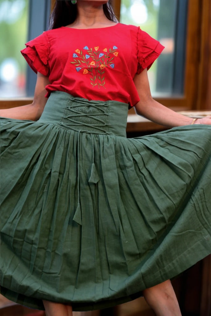
                  
                    ZEPHYRINE "- Olive  Green Corset-Skirt with sewn-in boning accentuated by a flared pleated Midi A-Line Skirt with Pockets.
                  
                