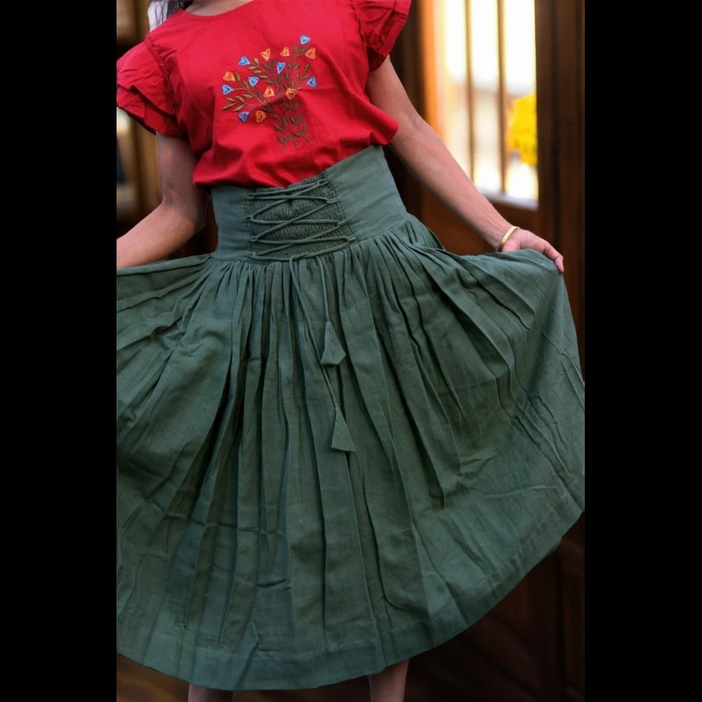 
                  
                    ZEPHYRINE "- Olive  Green Corset-Skirt with sewn-in boning accentuated by a flared pleated Midi A-Line Skirt with Pockets.
                  
                