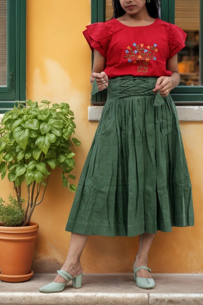 
                  
                    ZEPHYRINE "- Olive  Green Corset-Skirt with sewn-in boning accentuated by a flared pleated Midi A-Line Skirt with Pockets.
                  
                