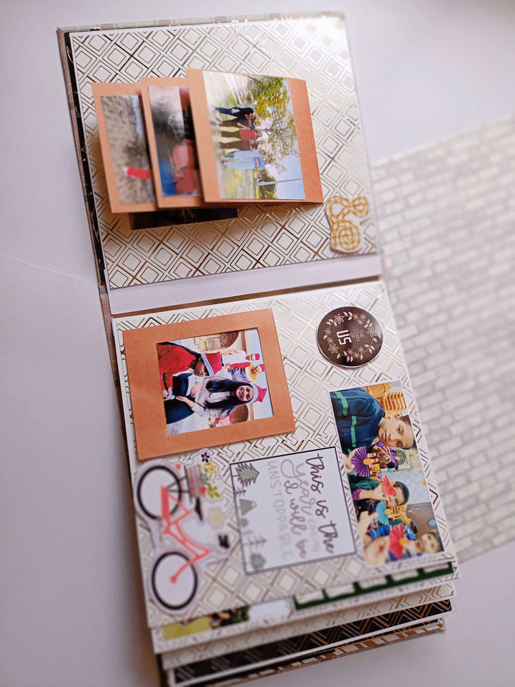 
                  
                    Golden and silver embossed scrapbook personalised with photos for all ocassions
                  
                