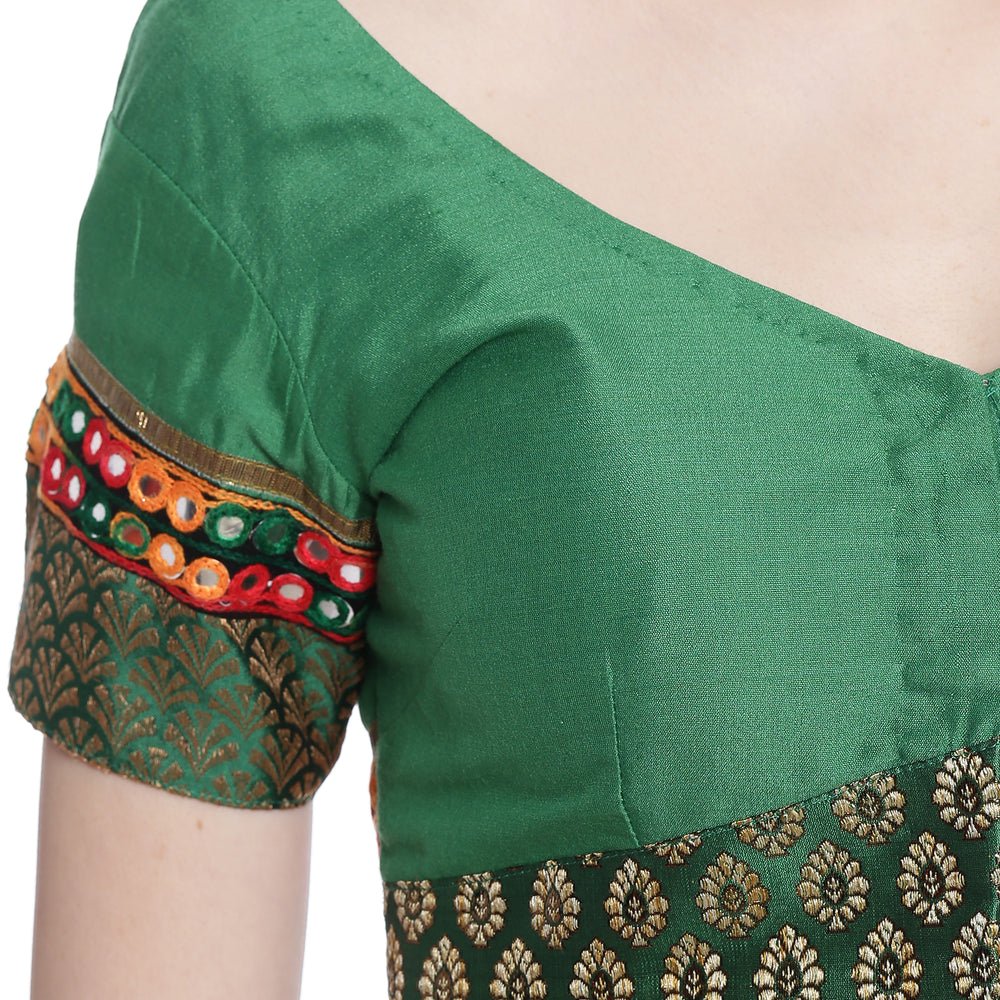 
                  
                    Green Cotton Silk Saree Blouse with Brocade and Mirror Border
                  
                