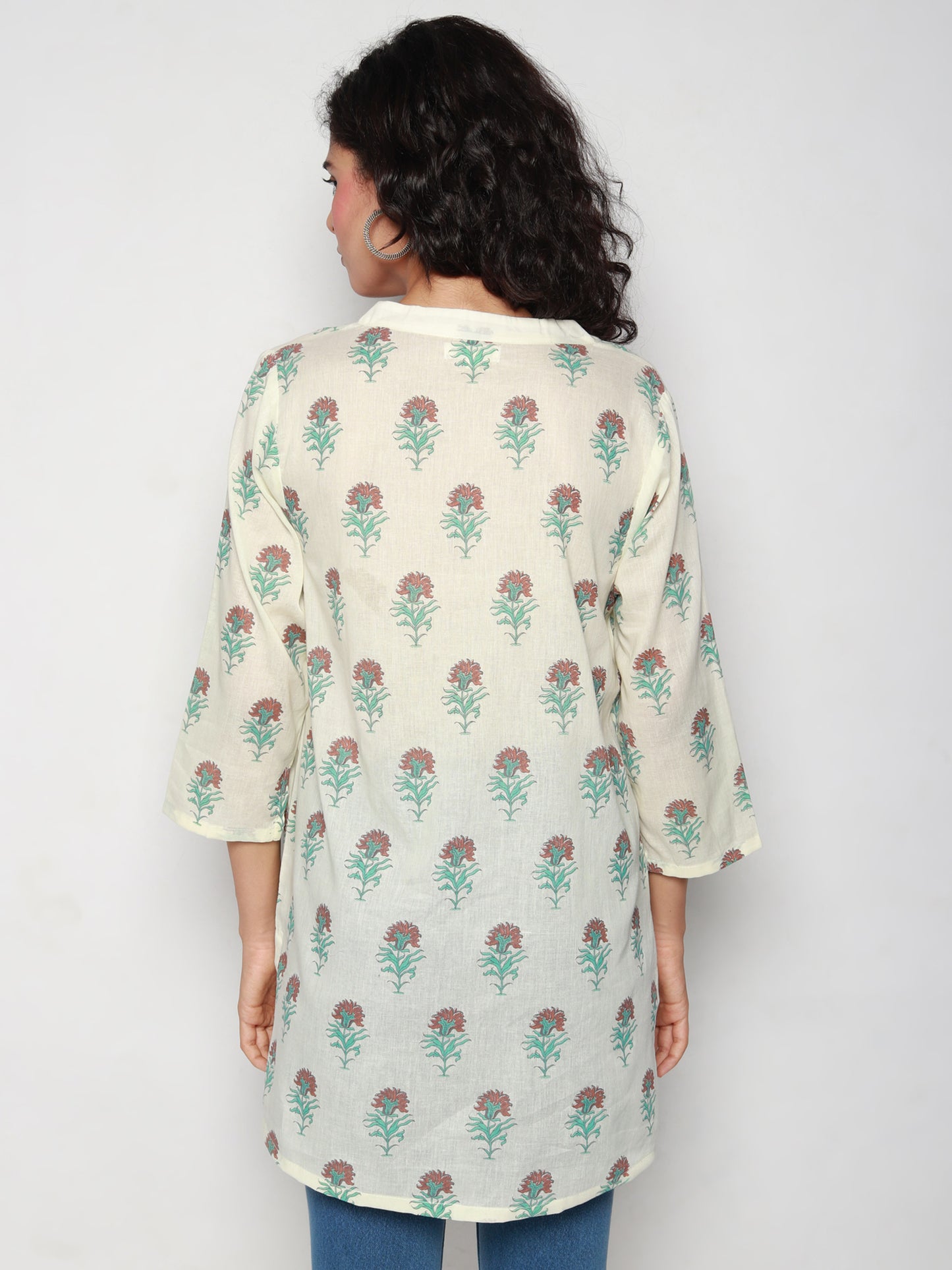 
                  
                    Ivory Cotton Tunic with Floral Block Prints
                  
                