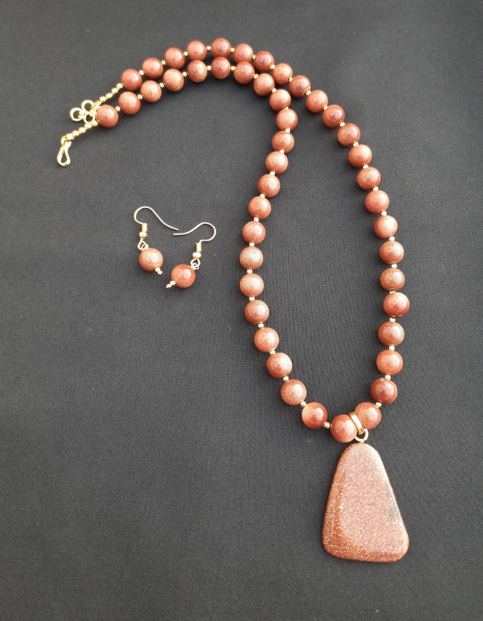 Sparkling sunstone beads necklace with matching earrings