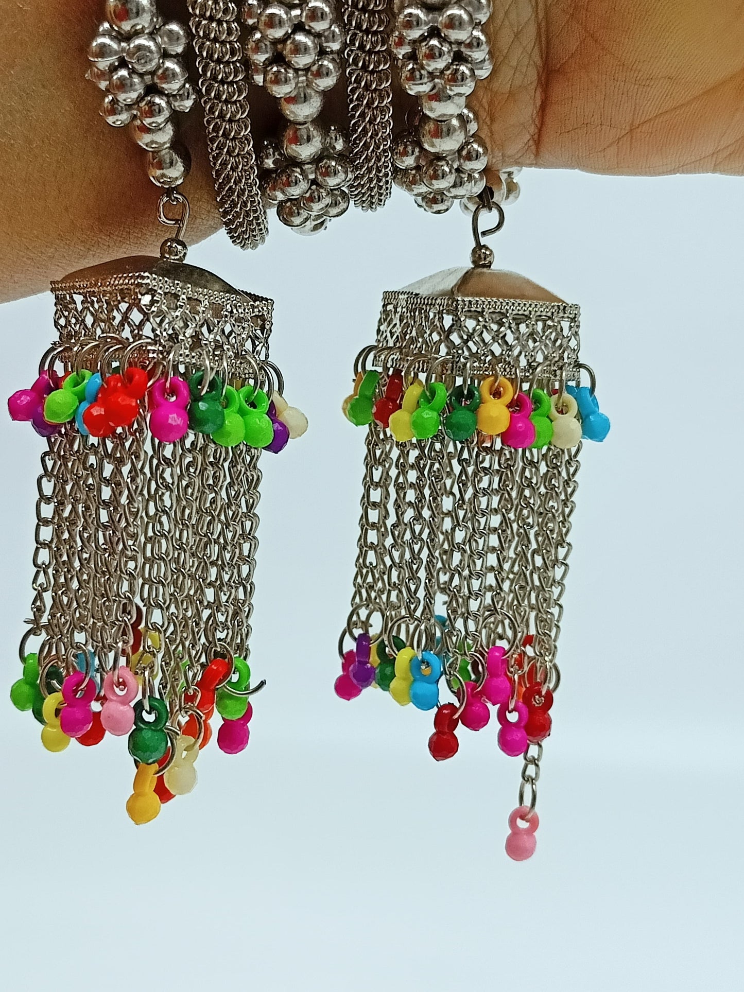 
                  
                    Oxidized Silver Tone Tribal Bangle Set with Colorful Bead & Chain Jhumkis - Set of 2
                  
                