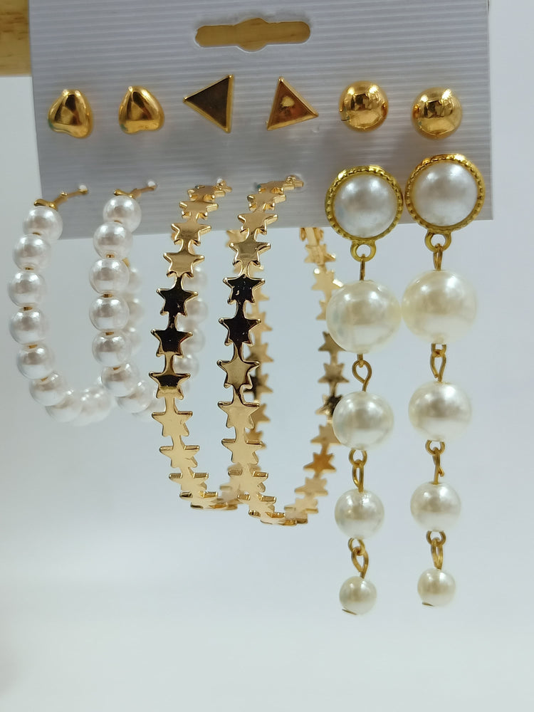 
                  
                    Elegant Pearl Drop Earrings with Oval Gold Frame
                  
                