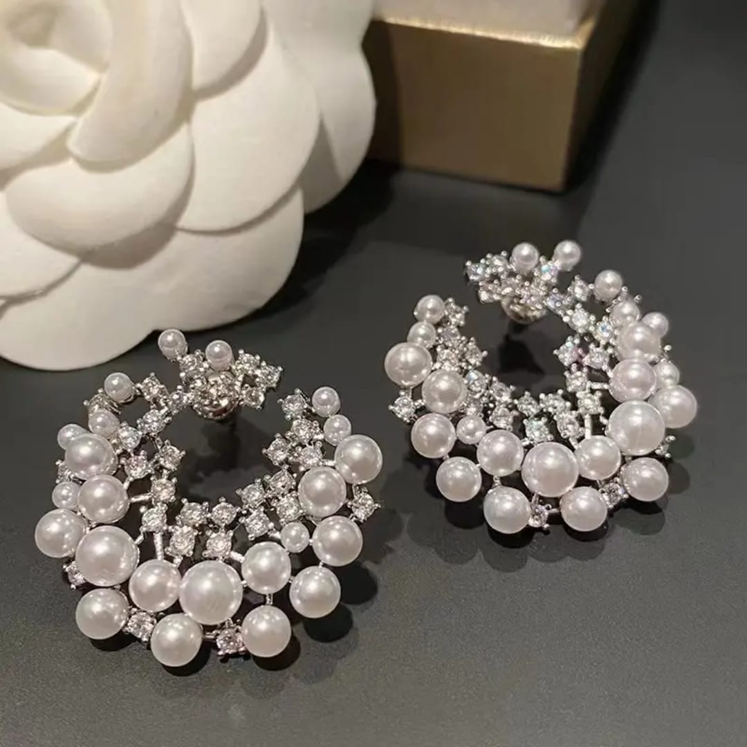 
                  
                    Luxurious Pearl and American Diamond Stud Earrings - Bridal & Occasion Wear
                  
                