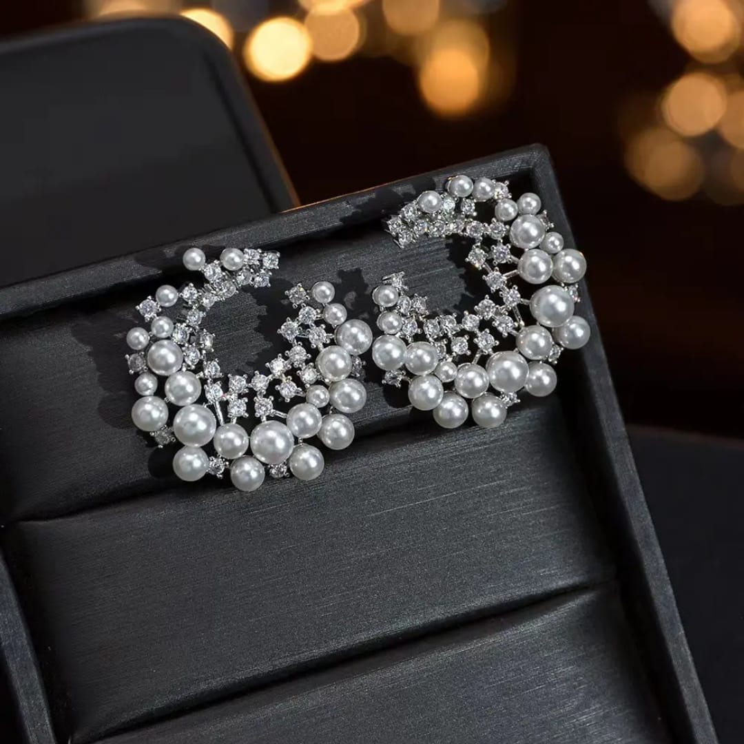 
                  
                    Luxurious Pearl and American Diamond Stud Earrings - Bridal & Occasion Wear
                  
                