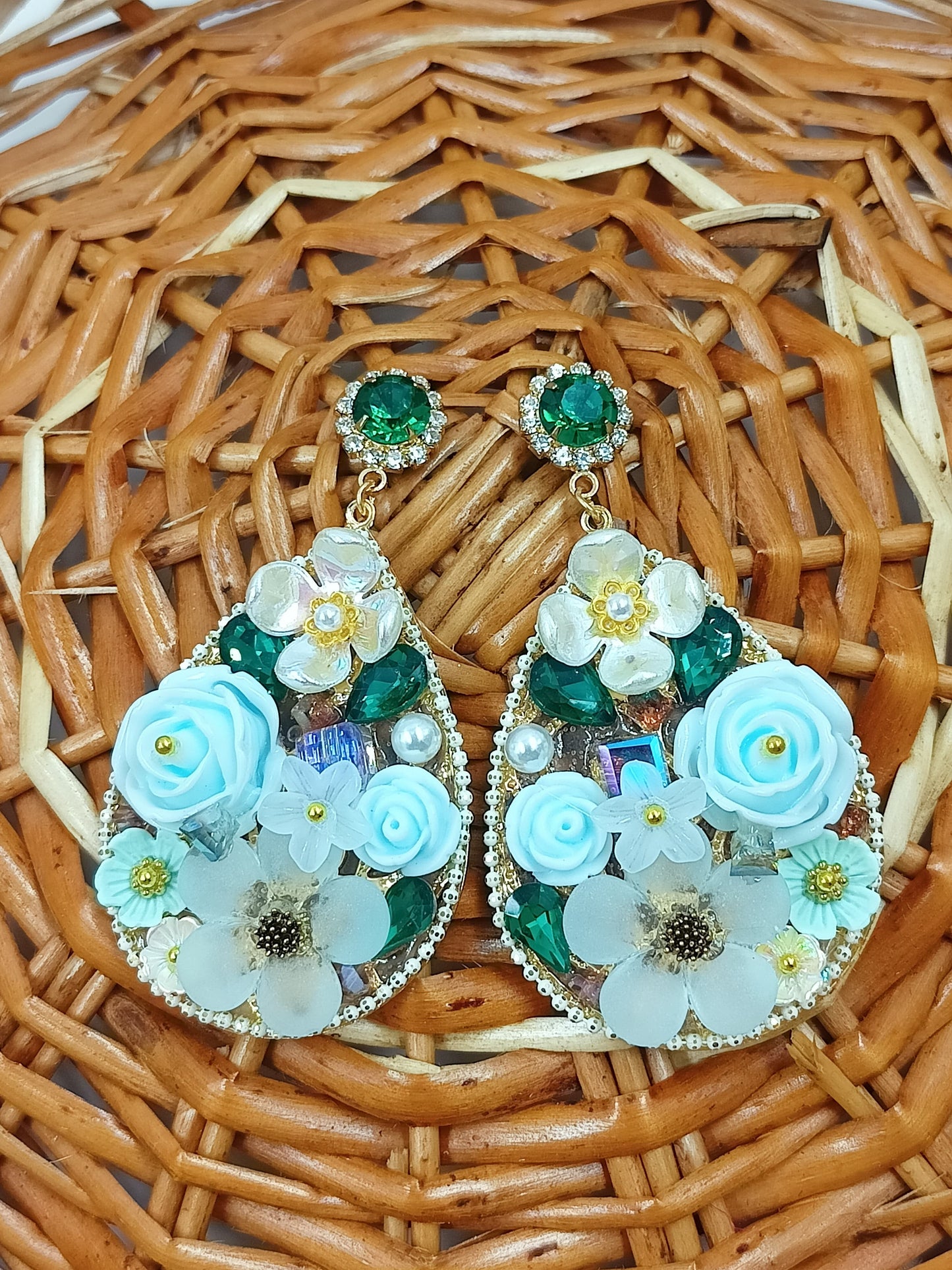 
                  
                    Elegant Floral Dangle Earrings with Blue and Green Accents
                  
                