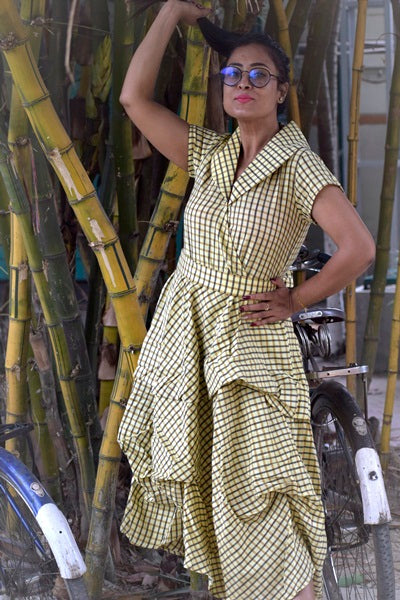 
                  
                    OYSTER BAY – Handcrafted Flattering wrapped and ruched Tartan Dress with V Neck & Short Sleeves.
                  
                